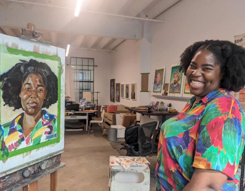 Jamila Modeste, of East Flatbush, Brooklyn, poses with her likeness. wearesouthbrooklyn/Instagram