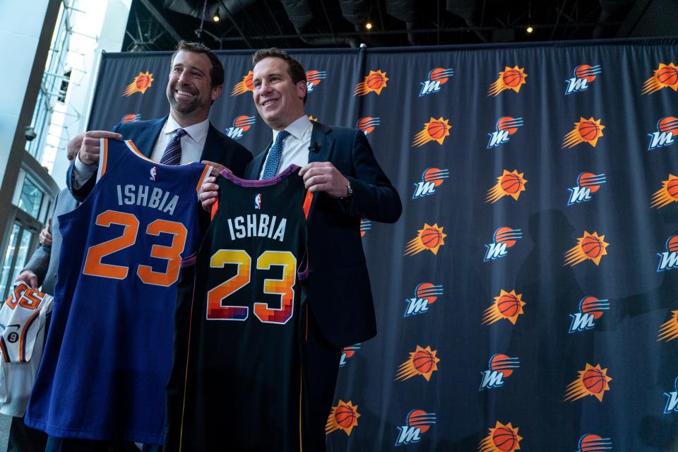 Justin Ishbia (left) and his brother Mat Ishbia attend a news conference introducing Mat Ishbia as the new majority owner of the Suns and Mercury at Footprint Center in Phoenix on Feb. 8, 2023.