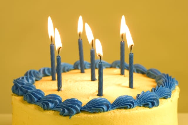 Birthday Cake With Seven Lit Candles