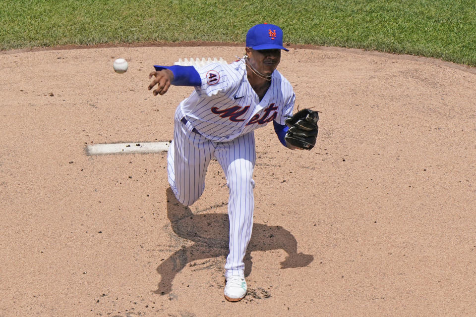 New York Mets starting pitcher Marcus Stroman (0) delivers during the first inning of a baseball game against the Philadelphia Phillies, Sunday, June 27, 2021, in New York. (AP Photo/Kathy Willens)