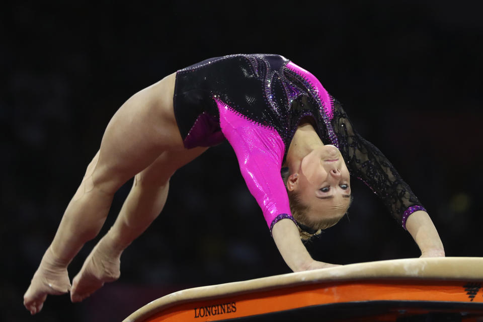 Angelina Melnikova of Russia performs on the vault in the women's all-around final at the Gymnastics World Championships in Stuttgart, Germany, Thursday, Oct. 10, 2019. (AP Photo/Matthias Schrader)