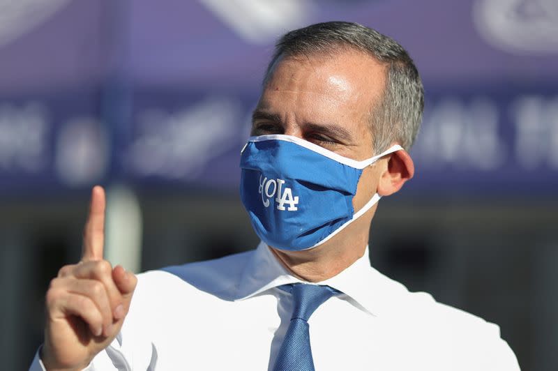 FILE PHOTO: First day of expanded California in-person voting, amid the global outbreak of the coronavirus disease (COVID-19), at Dodger Stadium sports venue in Los Angeles