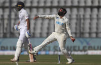 New Zealand's Ajaz Patel bowls during the day three of their second test cricket match with India in Mumbai, India, Sunday, Dec. 5, 2021.(AP Photo/Rafiq Maqbool)