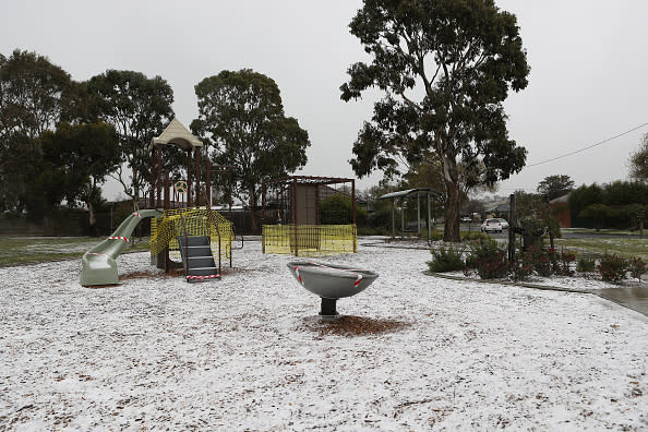 Snow seen fallen on a playground in Sunbury, Victoria.