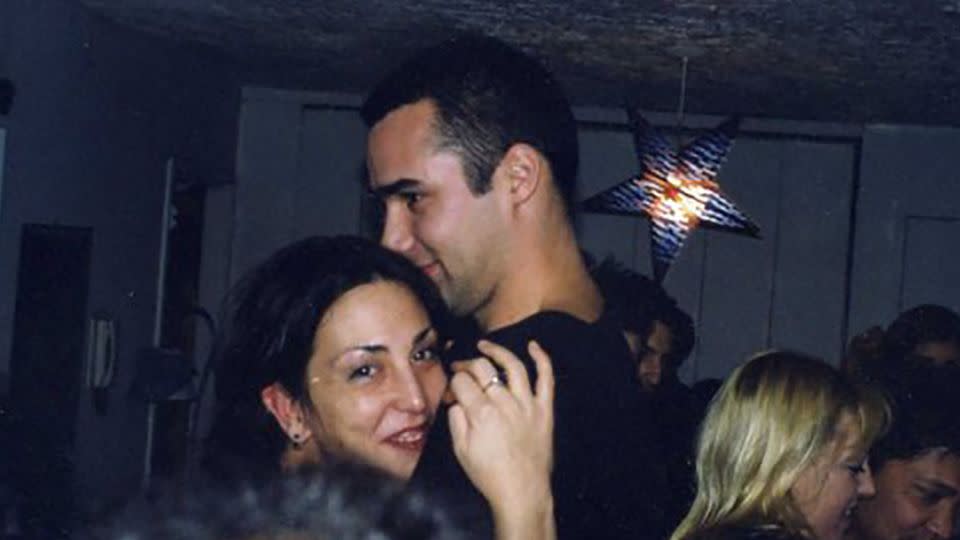 The couple got engaged at a New Year's Eve party in 1999. This photo was taken right after Richard asked Dina to marry him as the clock struck midnight. - Courtesy Dina Honour