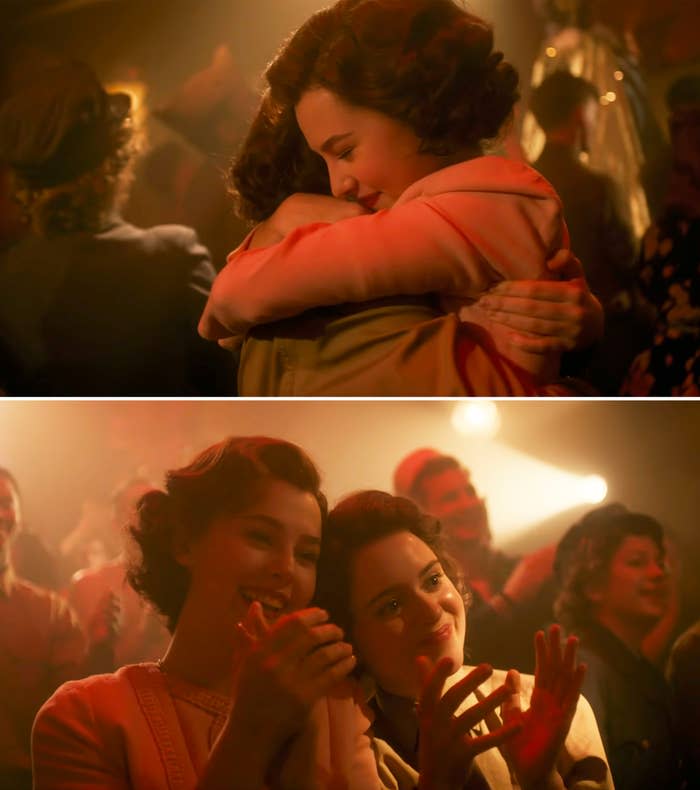 A young Margaret and Elizabeth hugging and then applauding in a crowd