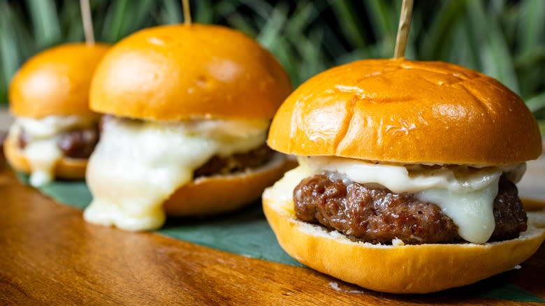 Burgers on a wooden table