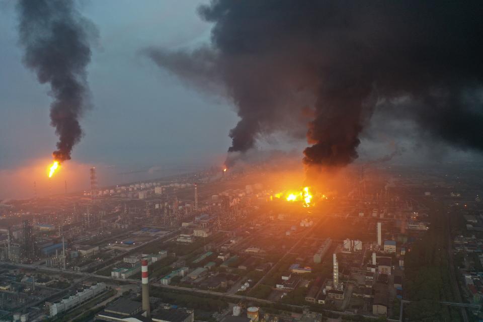 This aerial photo taken on June 18, 2022 shows a large fire at a Sinopec Shanghai Petrochemical plant in outlying Jinshan district of Shanghai. - China OUT (Photo by CNS / AFP) / China OUT (Photo by CNS/AFP via Getty Images)