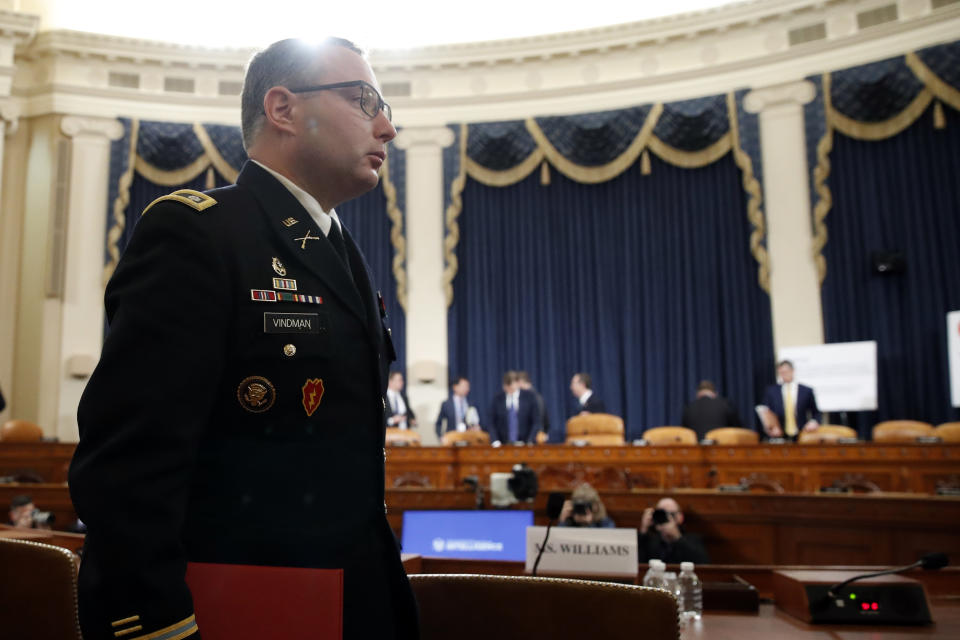 National Security Council aide Lt. Col. Alexander Vindman departs after testifying before the House Intelligence Committee on Capitol Hill in Washington, Tuesday, Nov. 19, 2019, during a public impeachment hearing of President Donald Trump's efforts to tie U.S. aid for Ukraine to investigations of his political opponents. (AP Photo/Alex Brandon)