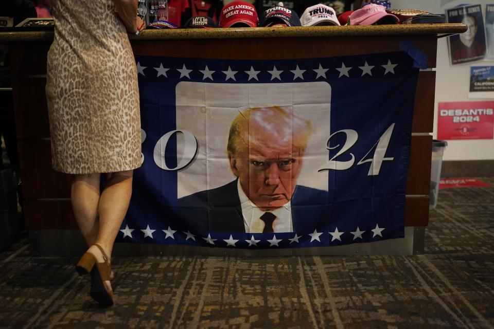An image of former President Donald Trump’s mugshot is displayed at a souvenir kiosk at the California Republican Party Convention, Friday, Sept. 29, 2023, in Anaheim, Calif. 