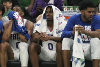 Philadelphia 76ers guard Tyrese Maxey (0) is seated near guard De'Anthony Melton, left, as the 76ers trail the Boston Celtics during the second half of Game 7 in the NBA basketball Eastern Conference semifinals playoff series, Sunday, May 14, 2023, in Boston. (AP Photo/Steven Senne)