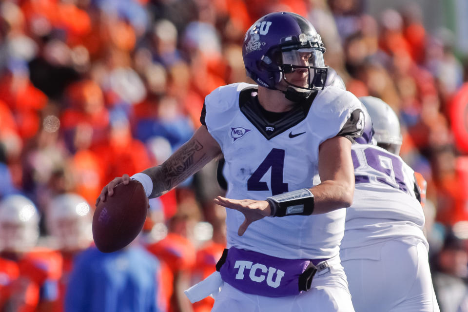 BOISE, ID - NOVEMBER 12: Casey Pachall #4 of the TCU Horned Frogs looks for a receiver against the Boise State Broncos at Bronco Stadium on November 12, 2011 in Boise, Idaho. (Photo by Otto Kitsinger III/Getty Images)