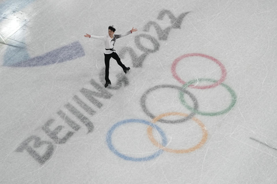 Vincent Zhou, of the United States, competes in the men's team free skate program during the figure skating competition at the 2022 Winter Olympics, Sunday, Feb. 6, 2022, in Beijing. (AP Photo/Jeff Roberson)
