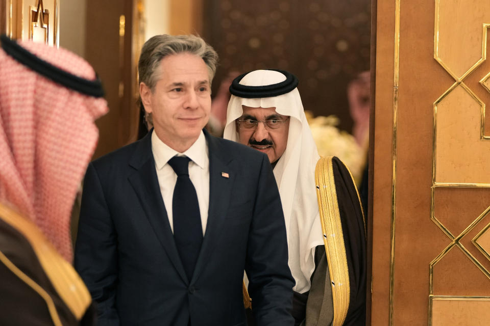 US Secretary of State Antony Blinken leaves with Saudi Arabia's Minister of State and National Security Musaed Al Aiban, right, after a meeting with Saudi Arabia's Crown Prince Mohammed bin Salman, in Riyadh, Saudi Arabia, Monday, Feb. 5, 2024. (AP Photo/Mark Schiefelbein, Pool)