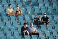 Socially distanced fans attend a match between Sebastian Korda and Radu Albot, of Moldova, during the Miami Open tennis tournament Thursday, March 25, 2021, in Miami Gardens, Fla. (AP Photo/Wilfredo Lee)