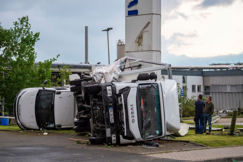 Two trucks were overturned in Paderborn after high winds hit western Germany  (AP)