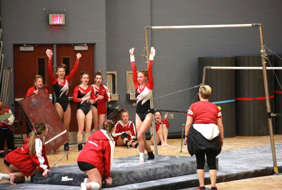 Coldwater's Charlotte Calhoun finishes off her tremendous Uneven Bar routine at Saturday's Flip Flop Invite at Rockford.