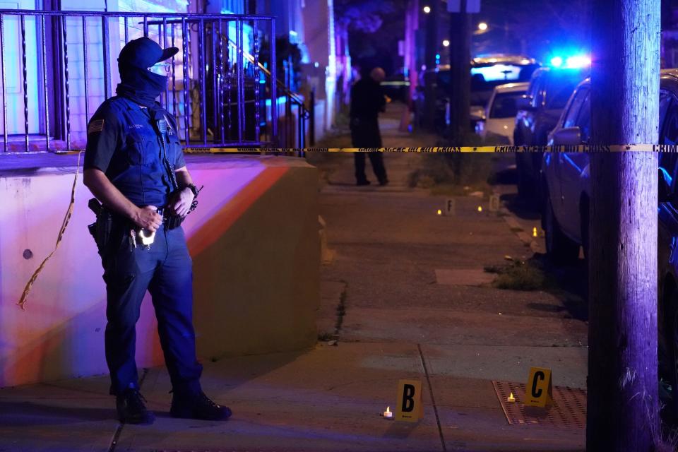 Police at the scene where two people were shot - one fatally - on Butler Street in Paterson, NJ around 1:20 a.m. on May 23, 2021.