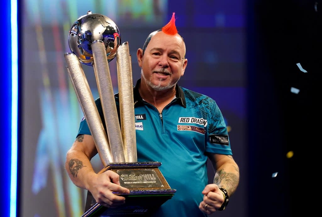 Peter Wright celebrates his victory over Michael Smith (John Walton/PA). (PA Wire)