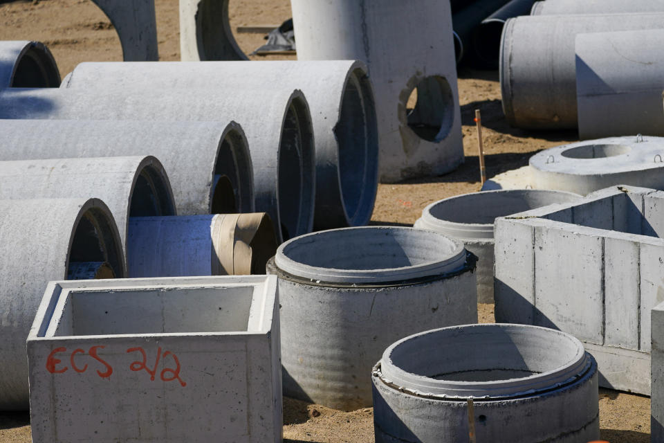 Reinforced concrete pipes sit at the construction site of the East Side Coastal Resiliency Project at the East River Park, Friday, Oct. 7, 2022, in New York. (AP Photo/Mary Altaffer)