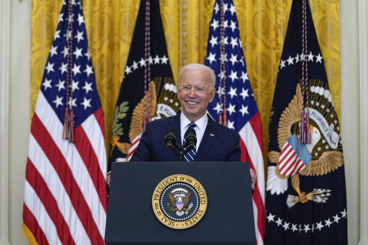 President Joe Biden smiles as he speaks during a news conference in the East Room of the White House, Thursday, March 25, 2021, in Washington. (Evan Vucci/AP Photo)