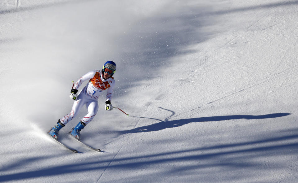United States' Laurenne Ross comes to a halt in the finish area after a women's downhill training run for the Sochi 2014 Winter Olympics, Thursday, Feb. 6, 2014, in Krasnaya Polyana, Russia. (AP Photo/Christophe Ena)