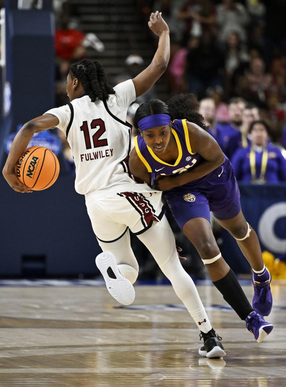 greenville, south carolina march 10 flaujae johnson 4 of the lsu lady tigers fouls milaysia fulwiley 12 of the south carolina gamecocks in the fourth quarter during the championship game of the sec womens basketball tournament at bon secours wellness arena on march 10, 2024 in greenville, south carolina photo by eakin howardgetty images