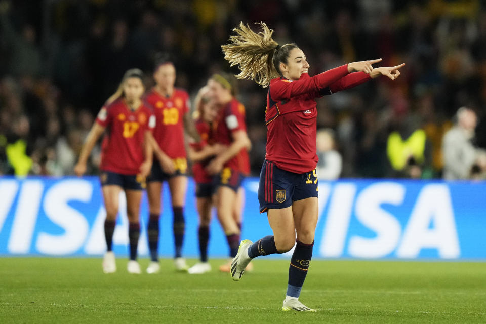 Spain's Olga Carmona celebrates after scoring the opening goal during the final of Women's World Cup soccer between Spain and England at Stadium Australia in Sydney, Australia, Sunday, Aug. 20, 2023. (AP Photo/Rick Rycroft)