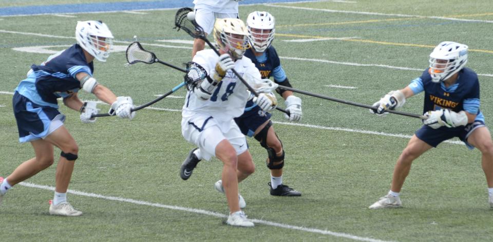 Rowyn Nurry of Salesianum manuevers through the Viking defgense in the first half of the DIAA Boys Lacrosse championship game on Saturday at Dover High.