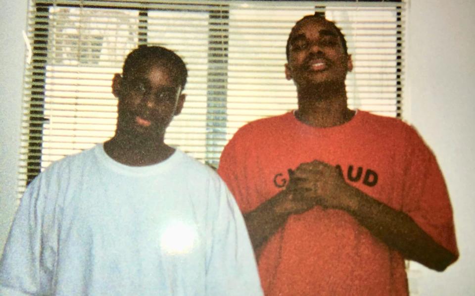 McKenzie Cochran of Ferndale, left, poses in this undated photo with his brother, Michael Cochran, who hopes the Black Lives Matter movement helps reopen his brother's death investigation.