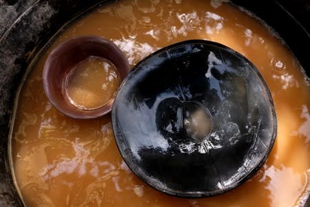 Tubs used for panning gold at a site in Bawdie