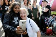 Emma Thompson snaps a selfie with Extinction Rebellion supporters during a protest in London on Friday.