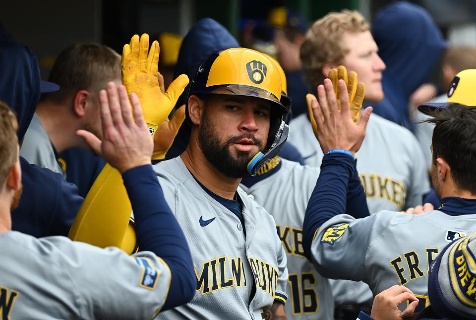 Gary Sánchez of the Milwaukee Brewers celebrates with teammates in the dugout after hitting a two-run homer in the eighth inning against the Pittsburgh Pirates at PNC Park on Thursday afternoon.