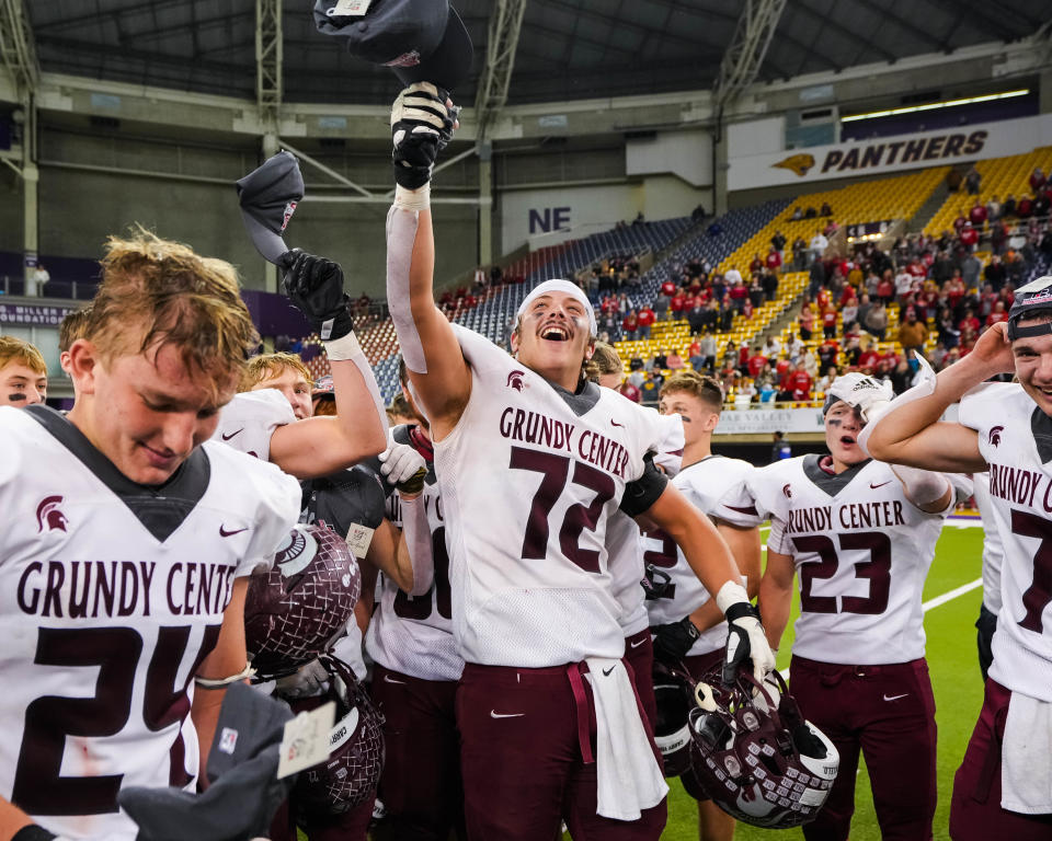 Grundy Center lineman Patrick Brown III (72) celebrates after winning the Class A playoff championship on Thursday, Nov. 17, 2022, at the UNI-Dome in Cedar Falls. The Spartans defeated the Eagles, 27-0.