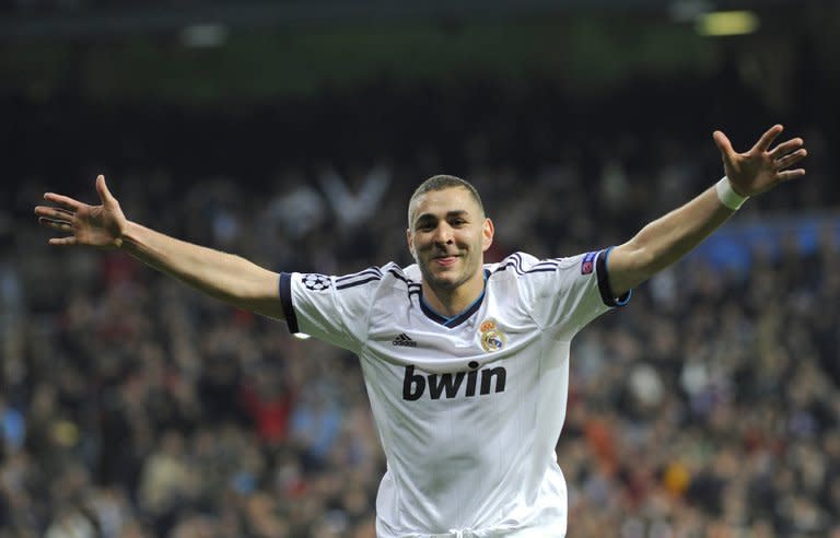 Real Madrid's French forward Karim Benzema celebrates after scoring during the UEFA Champions League quarter-final first leg football match Real Madrid vs Galatasaray on April 3, 2013 at the Santiago Bernabeu stadium in Madrid. Real won 3-0