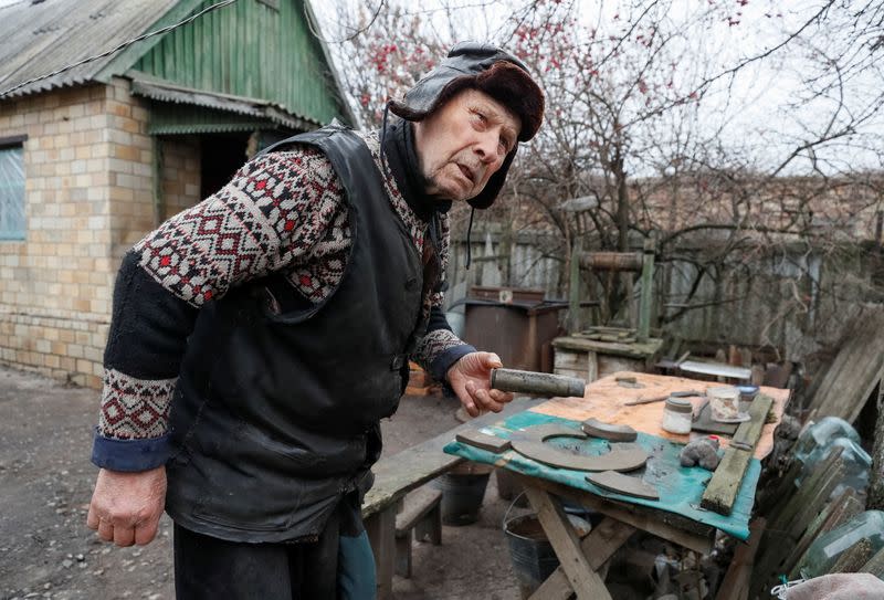 Local resident Kudla is seen near his house near the front line in the village of Zaitseve