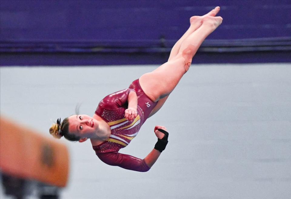 Bloomington North’s Jessica Floyd performs her floor routine during the gymnastics meet against Bloomington South and Edgewood at South on Monday, Jan. 8, 2024.