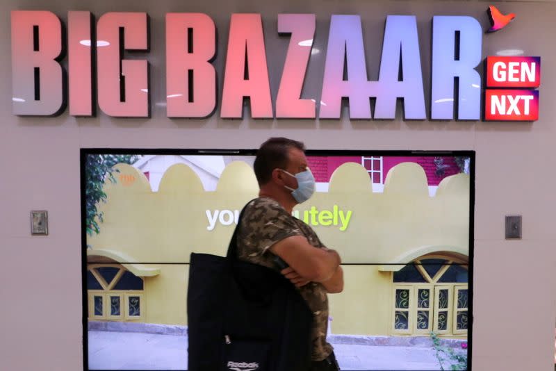 FILE PHOTO: Man walks inside the Big Bazaar retail store in Mumbai