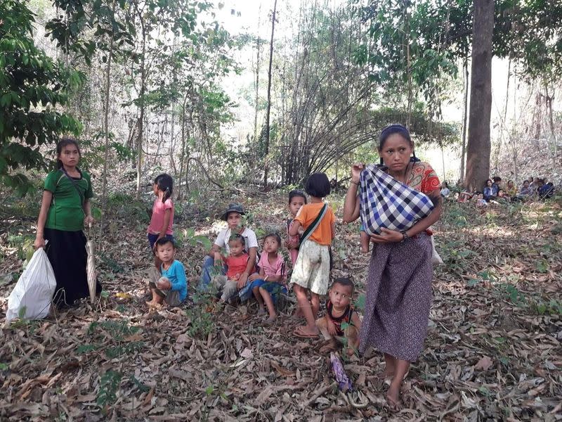 Escaping villagers from the Karen State are pictured in an unidentified location