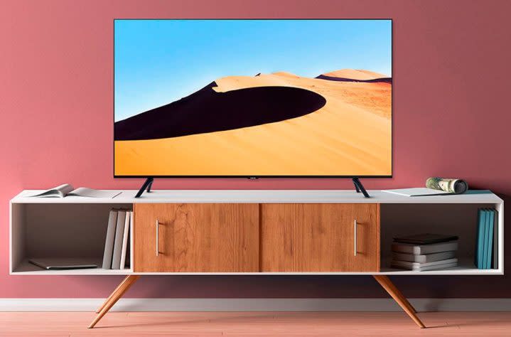 The Samsung 75-inch LED 4K Smart TV on a media cabinet.