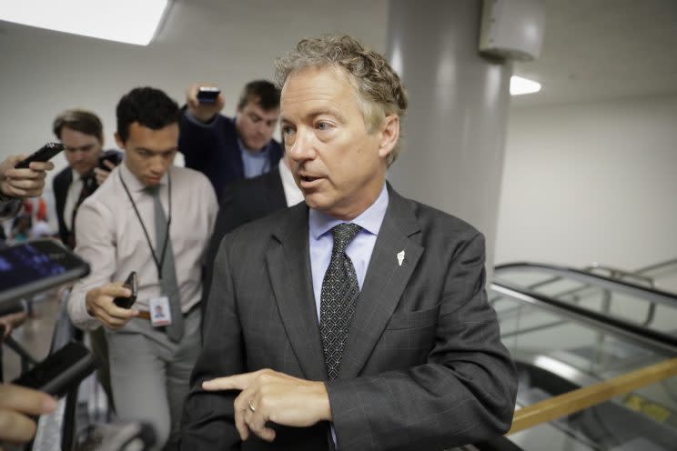 Sen. Rand Paul, R-Ky., a vocal opponent of the Senate Republican health care bill, speaks with reporters on his way to a vote on Capitol Hill in Washington, D.C., on July 12, 2017. (Photo: J. Scott Applewhite/AP)