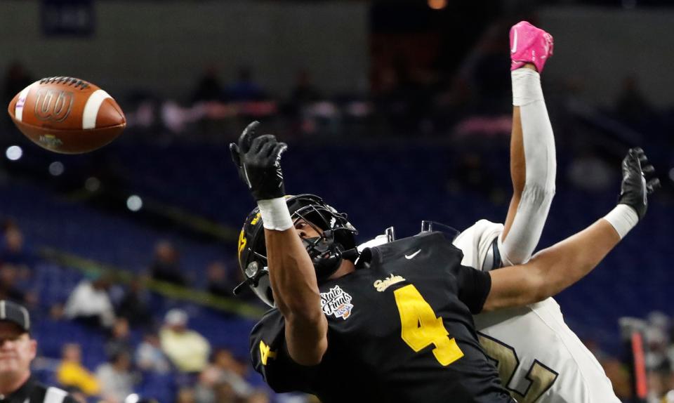 Fort Wayne Snider Panthers Brandon Logan (4) watches a pass intended for him fall incomplete, Friday, Nov. 24, 2023, after the 51st annual IHSAA state football finals against the Decatur Central Hawks at Lucas Oil Stadium in Indianapolis.