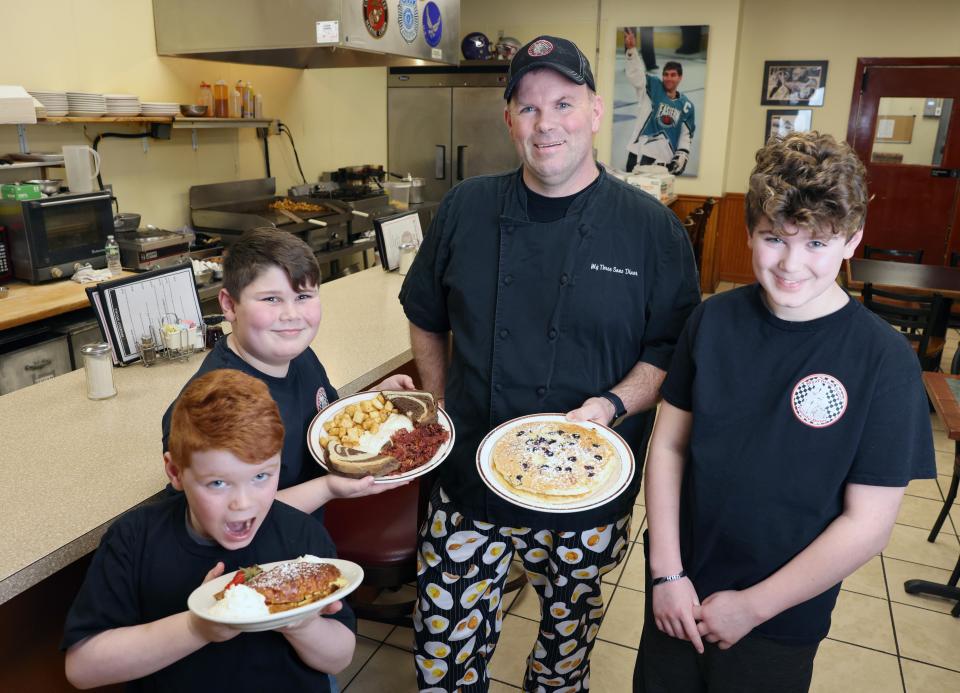 My Three Sons Diner owner Dave Morley with his sons Bredyn Morley, 12, right, Colin Morley, 10, left center, and Mason Morley, 7, on Wednesday, Jan. 10, 2024.