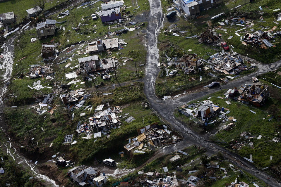 The community of Toa Alta lies in rubble on Sept. 28, 2017, after Hurricane Maria passed over Puerto Rico. (Photo: ASSOCIATED PRESS)