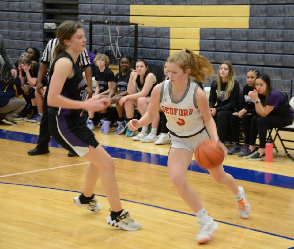 Grace Fulop of Bedford drives the baseline against Woodhaven Wednesday during a 48-27 Beford win in the semifinals of the Division 1 District at Trenton.