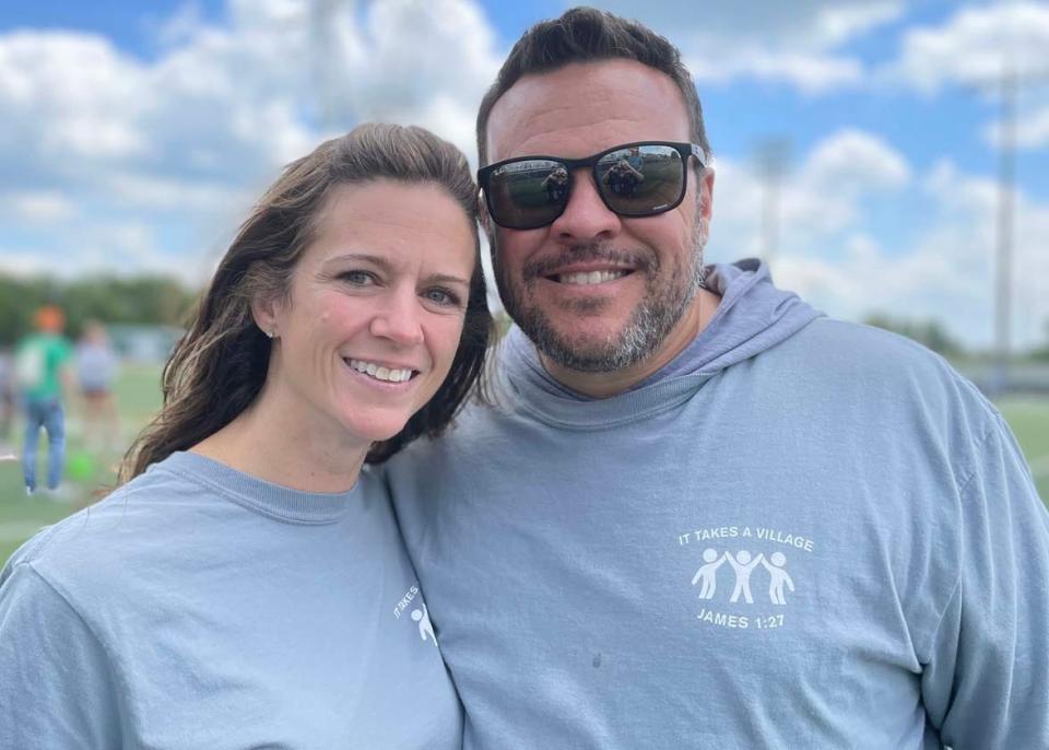 Event organizers Kelly and CJ Orrico enjoy the success of the Family Friendzy fundraiser held at Knoxville Catholic High School Sunday, April 30, 2023.