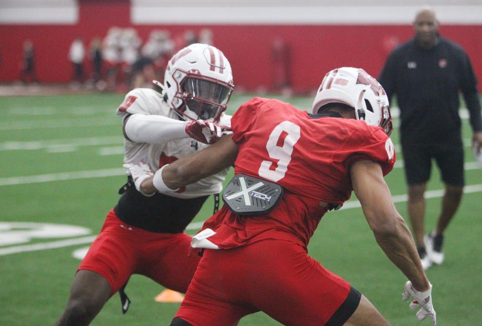 Cornerback RJ Delancy, left, a transfer from Toledo, has gotten some looks with Wisconsin's No. 1 defense.