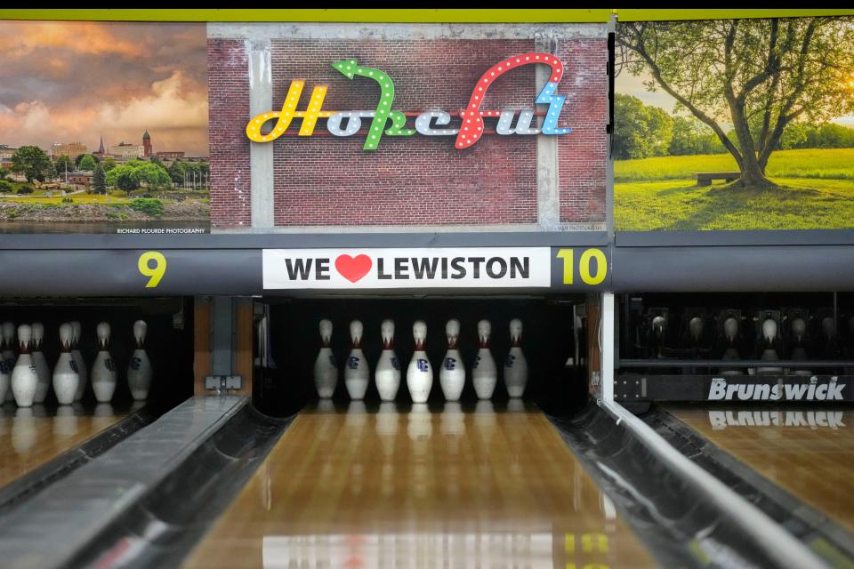 Photos of local scenes have been added to the decor at Just In Time Recreation, Wednesday, May 1, 2024, in Lewiston, Maine. The bowling alley, where eight people were killed in last October's mass shooting, was scheduled to reopen Friday, May 3. (AP Photo/Robert F. Bukaty)