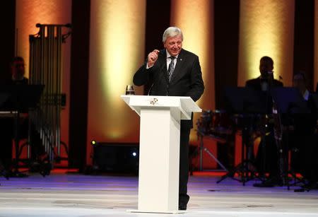 Hesse's state Premier Volker Bouffier makes a speech during a ceremony in the 'Alte Oper' in Frankfurt, Germany, October 3, 2015. REUTERS/Ralph Orlowski