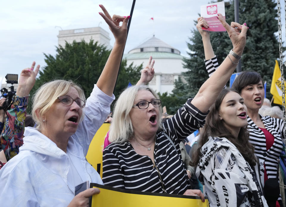 People demonstrate in defense of media freedom in Warsaw, Poland, on Tuesday, Aug. 10, 2021. Poles demonstrated nationwide Tuesday against a bill widely viewed as a effort by the country's nationalist ruling party to silence an independent, U.S.-owned television broadcaster that is critical of the government.(AP Photo/Czarek Sokolowski)